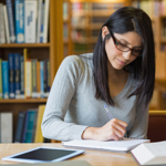Woman studying in a library