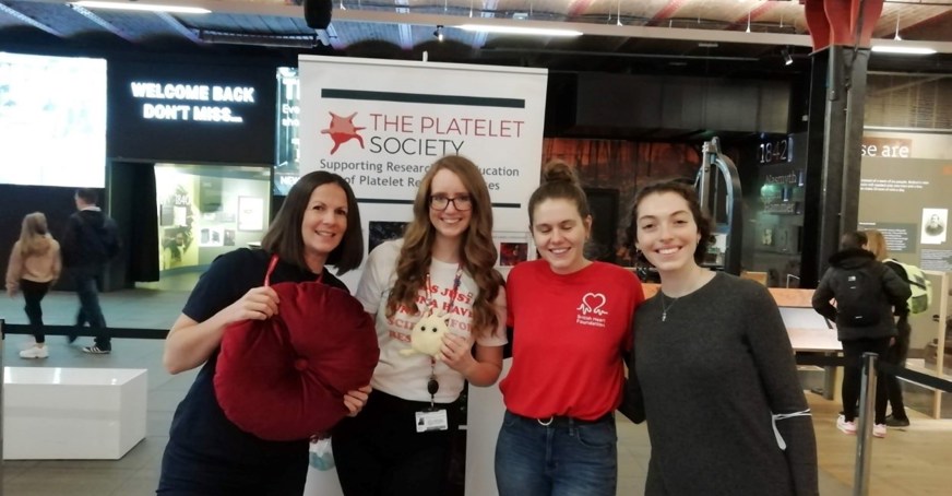 Group of scientists at a community fair