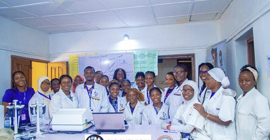 Group photo of the project attendees in a lab