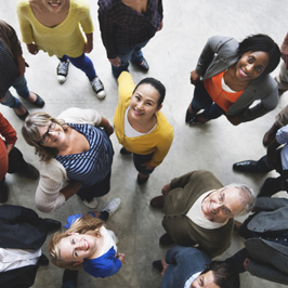 A stylized world map and a group of different people looking upwards