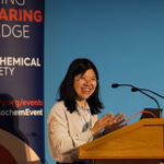 Speaker presenting at a Biochemical Society event