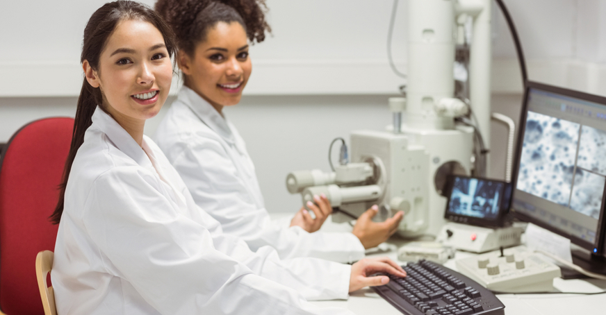 Two students working in a lab