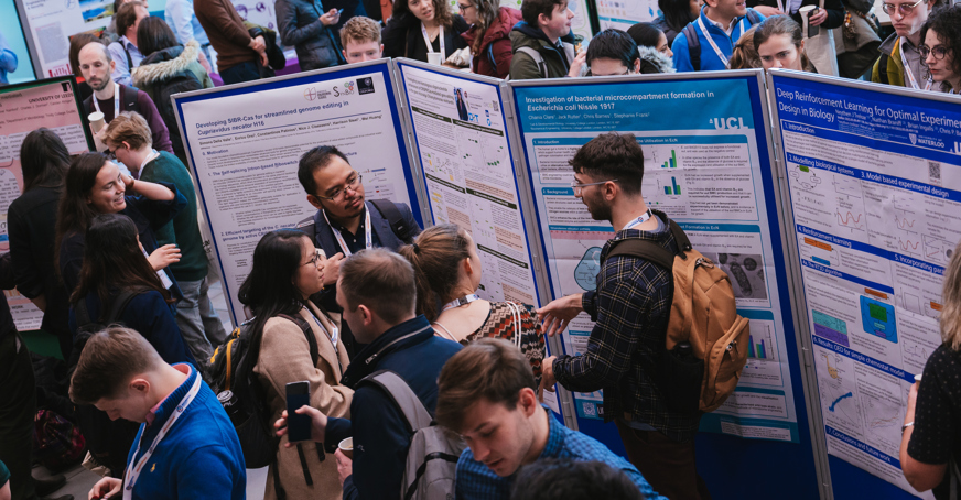 Group of attendees at a poster session